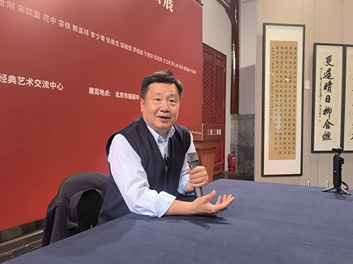 李少青和韩国强在第九届3月3书社全国名家书法展上开书法讲座